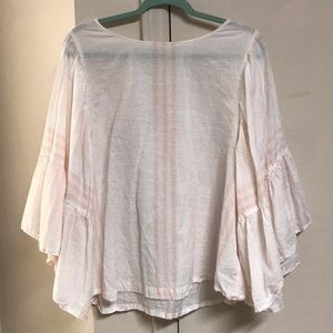baby pink/white striped top with bell sleeves.